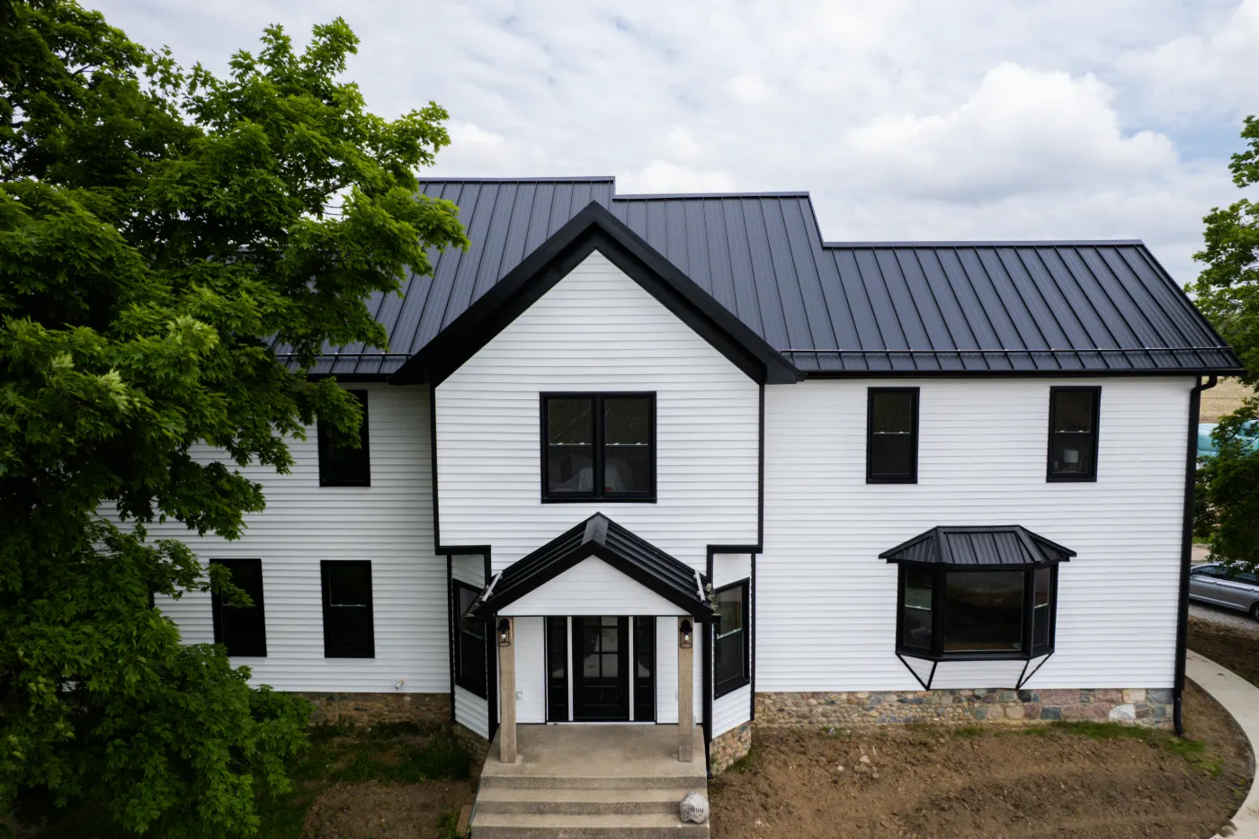 Siding installation documented in Britton Falls